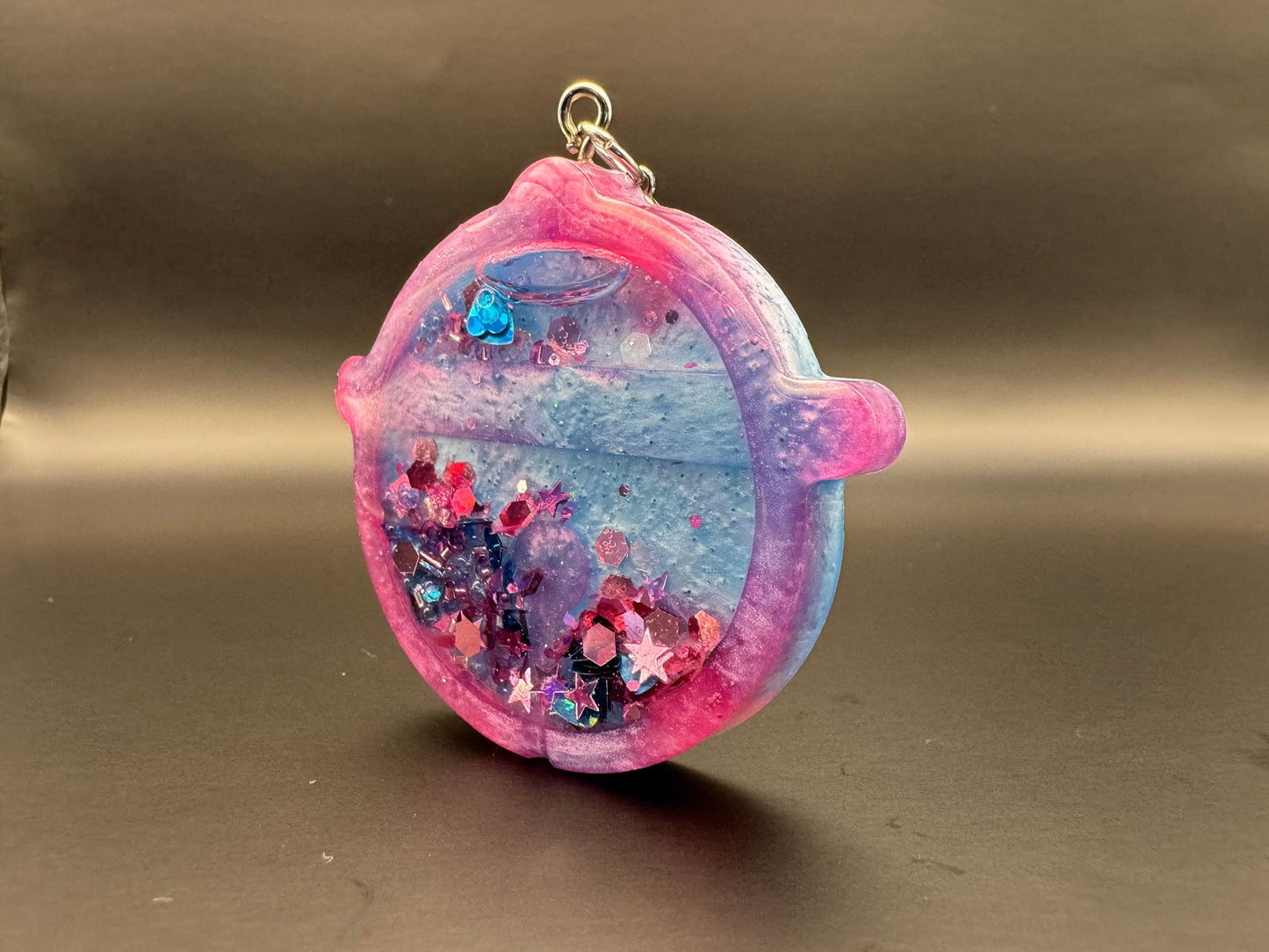 Blue and Pink Circular Resin Shaker with Pink and Blue Chunky Heart Star and Hexagonal Glitter Silver Keychain